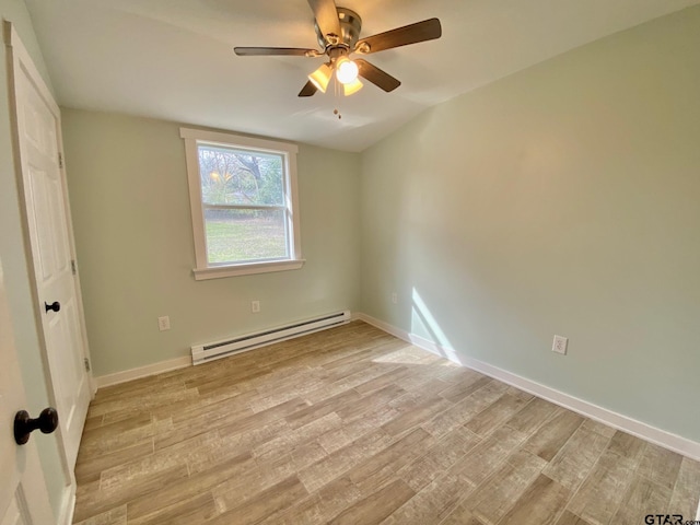 empty room with a baseboard heating unit, light hardwood / wood-style floors, and ceiling fan