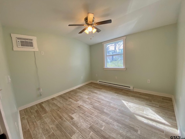 spare room with light hardwood / wood-style flooring, ceiling fan, a baseboard radiator, and a wall mounted AC