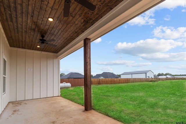 view of patio featuring ceiling fan