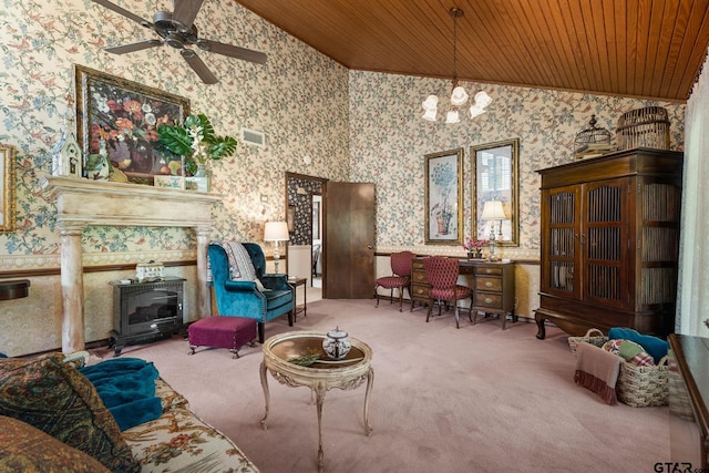 living area with ceiling fan with notable chandelier, carpet, and wooden ceiling