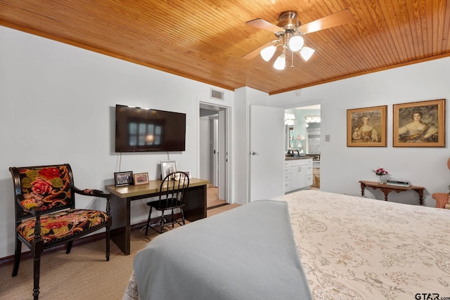 bedroom featuring ensuite bathroom, ceiling fan, wood ceiling, and carpet flooring