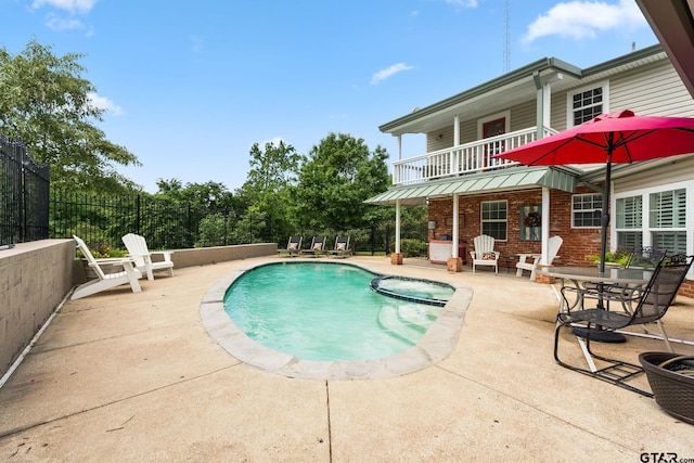 view of pool featuring a patio area