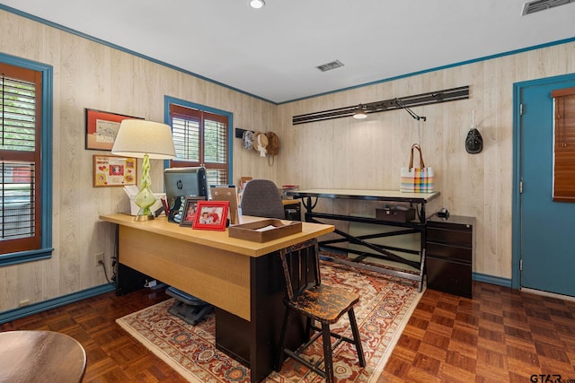 office area featuring wood walls and dark parquet floors