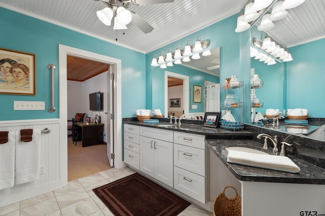 bathroom with wooden ceiling, tile patterned flooring, ceiling fan, vanity, and crown molding