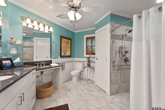 bathroom with toilet, vanity, ceiling fan, crown molding, and a shower with shower curtain