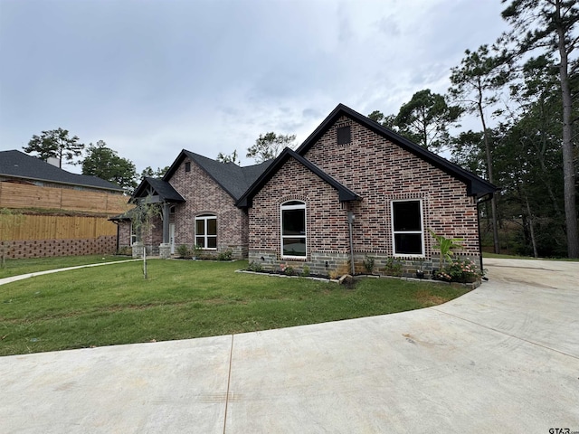 view of front of home with a front yard