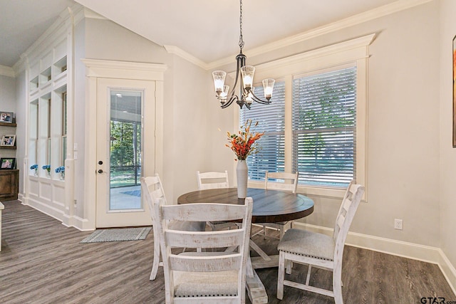 dining area with dark wood-type flooring, a wealth of natural light, and ornamental molding