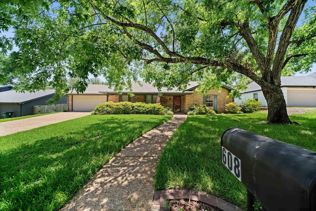 608 Meadow Crk, Tyler, TX 75703 - single story home with brick siding, a front lawn, a garage, and driveway