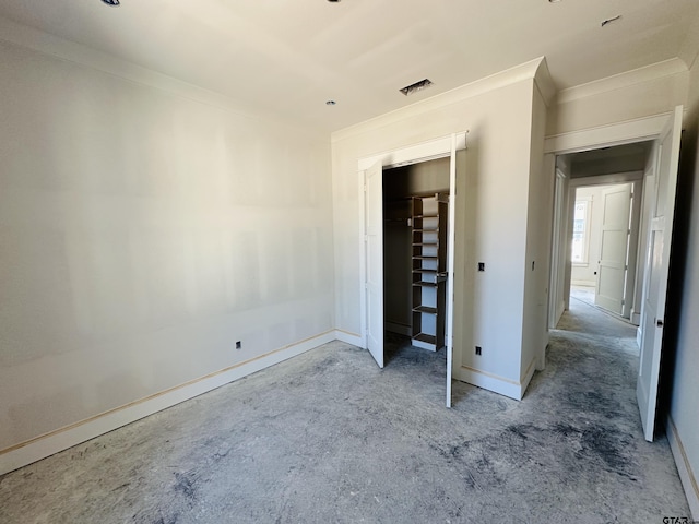 unfurnished bedroom with ornamental molding, visible vents, and baseboards