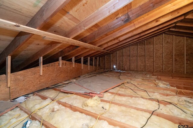 view of unfinished attic