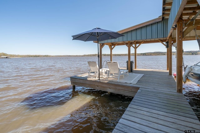 view of dock featuring a water view