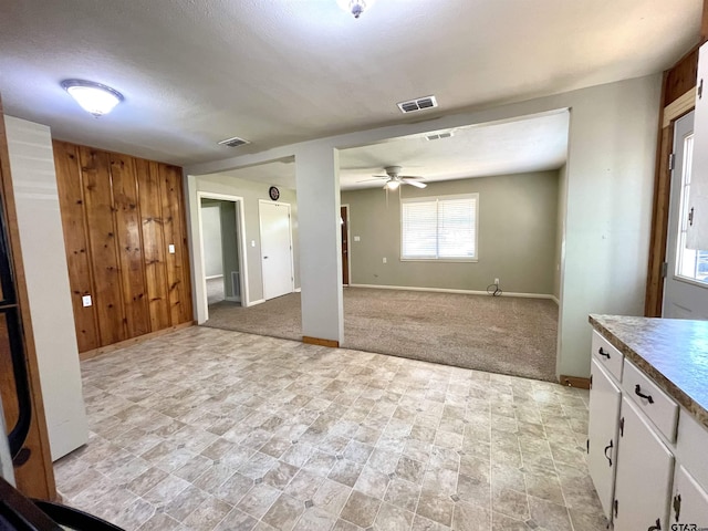 129 An County Rd 302, Frankston, TX 75763 - spare room with wooden walls, a ceiling fan, and baseboards