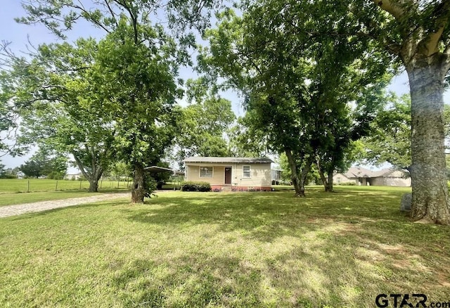 129 An County Rd 302, Frankston, TX 75763 - view of front facade with a front yard, a detached carport, and driveway