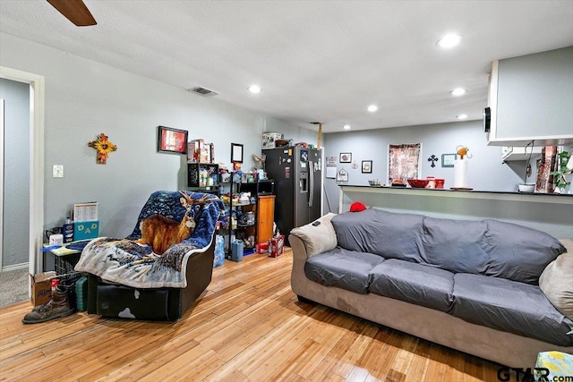 182 Moses St, Rusk, TX 75785 - living room featuring light wood-type flooring and recessed lighting