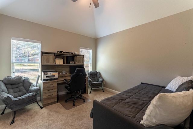 bedroom featuring ceiling fan, multiple windows, high vaulted ceiling, and light colored carpet