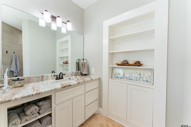 bathroom featuring tile patterned floors and vanity