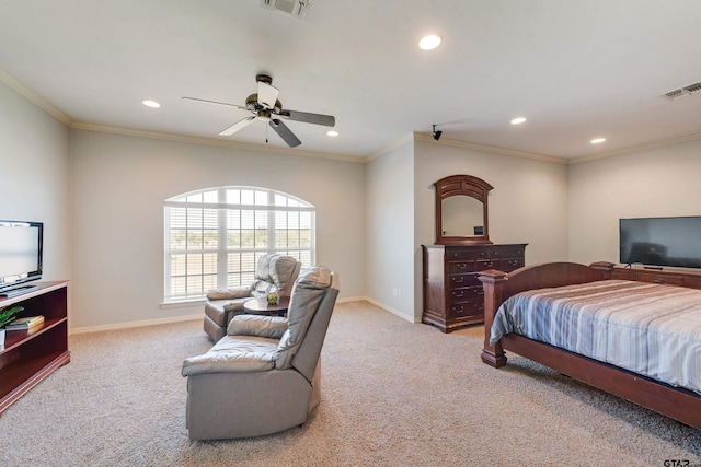 carpeted bedroom featuring ceiling fan and crown molding