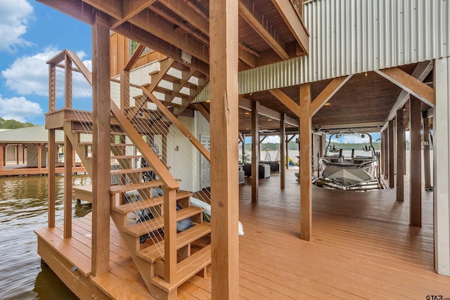 16822 Perry St, Tyler, TX 75707 - wooden terrace with boat lift, a dock, and stairs