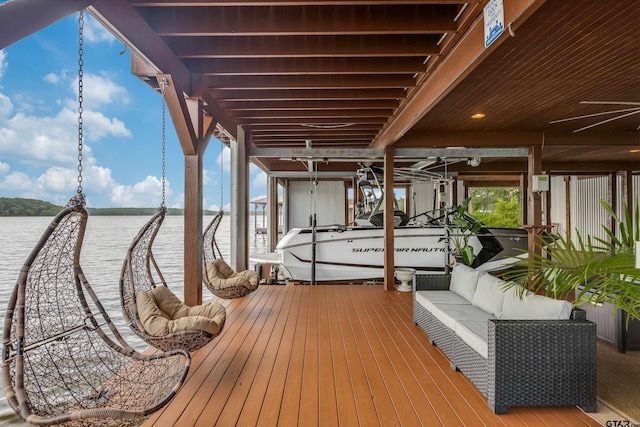 16822 Perry St, Tyler, TX 75707 - dock featuring boat lift, a water view, and outdoor lounge area