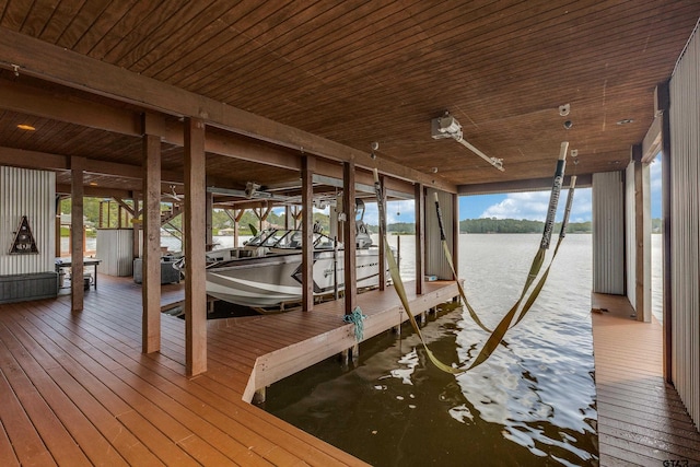 16822 Perry St, Tyler, TX 75707 - dock featuring boat lift and a water view