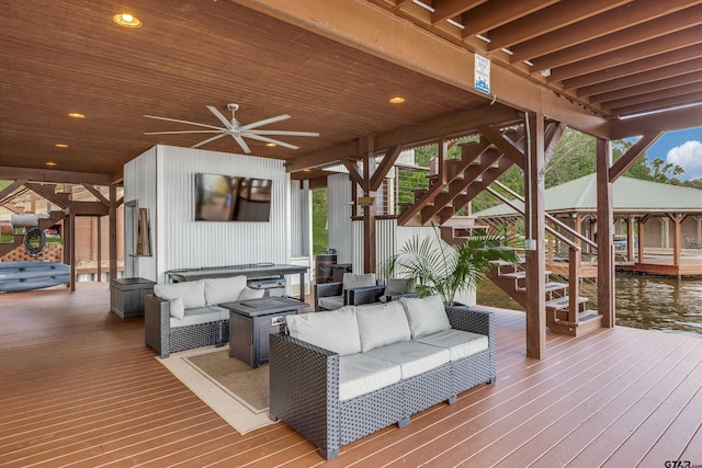 16822 Perry St, Tyler, TX 75707 - wooden terrace with an outdoor hangout area, stairway, and ceiling fan