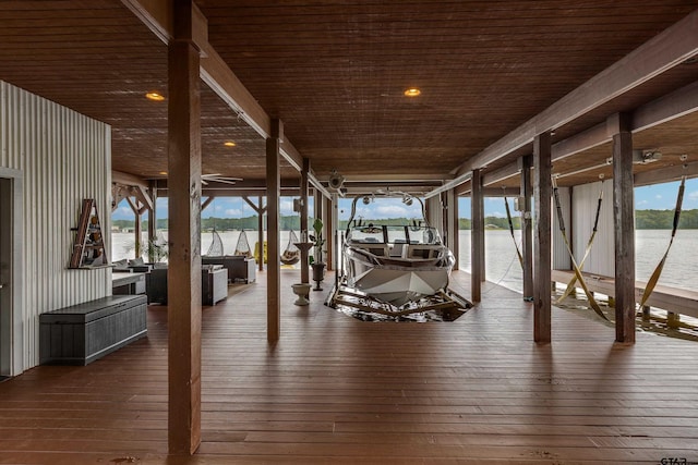 16822 Perry St, Tyler, TX 75707 - wooden deck with boat lift, a boat dock, and a water view