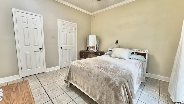 tiled bedroom featuring ornamental molding