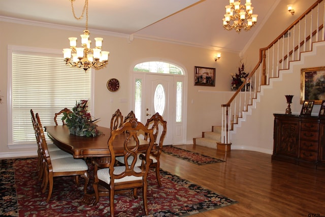 dining room featuring vaulted ceiling, crown molding, dark hardwood / wood-style flooring, and a notable chandelier