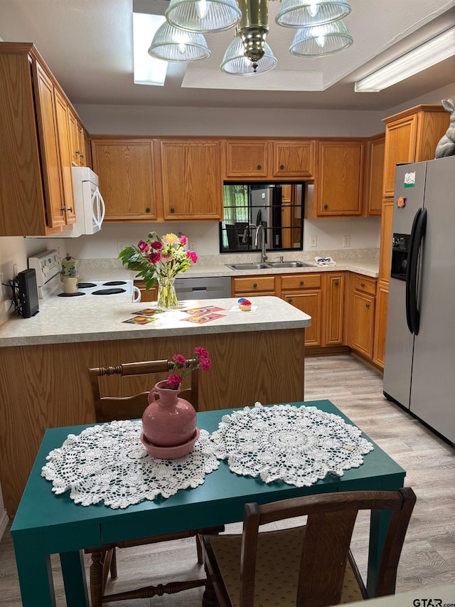 10764 Southern Trace Cir, Flint, TX 75762 - kitchen featuring white appliances, a sink, and light countertops
