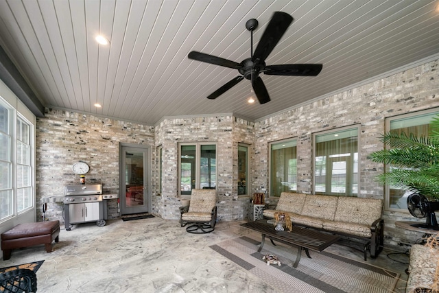 exterior space featuring grilling area, ceiling fan, and an outdoor hangout area