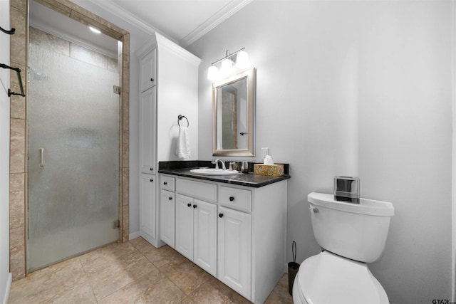 bathroom with walk in shower, vanity, toilet, and crown molding