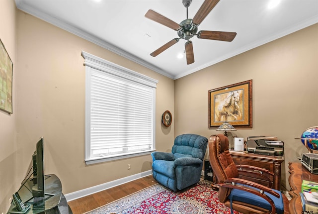 office with hardwood / wood-style flooring, ceiling fan, and crown molding