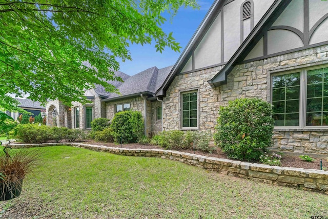 exterior space with a front lawn