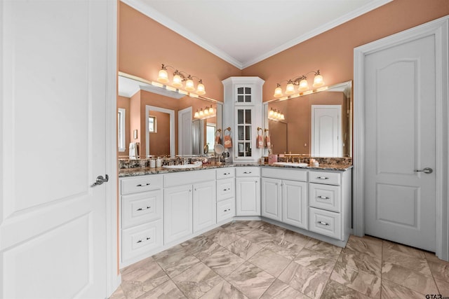 bathroom with vanity and crown molding