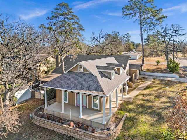 view of side of property featuring a patio