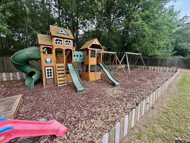 606 Glazner St, Hawkins, TX 75765 - view of playground with view of scattered trees