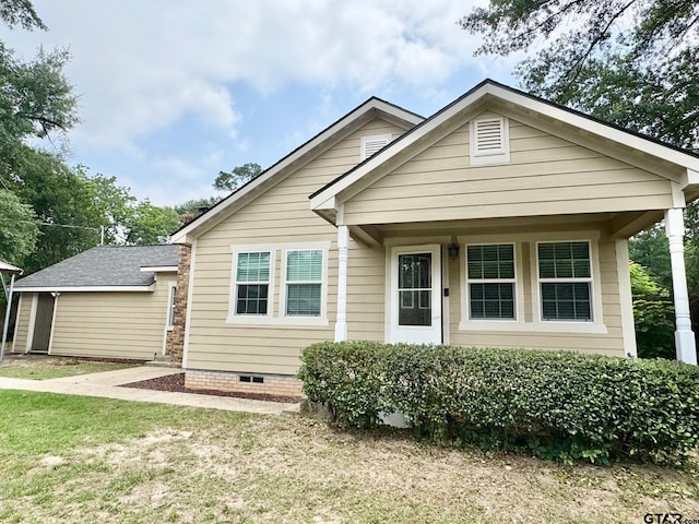 606 Glazner St, Hawkins, TX 75765 - view of front of property featuring a front lawn and crawl space