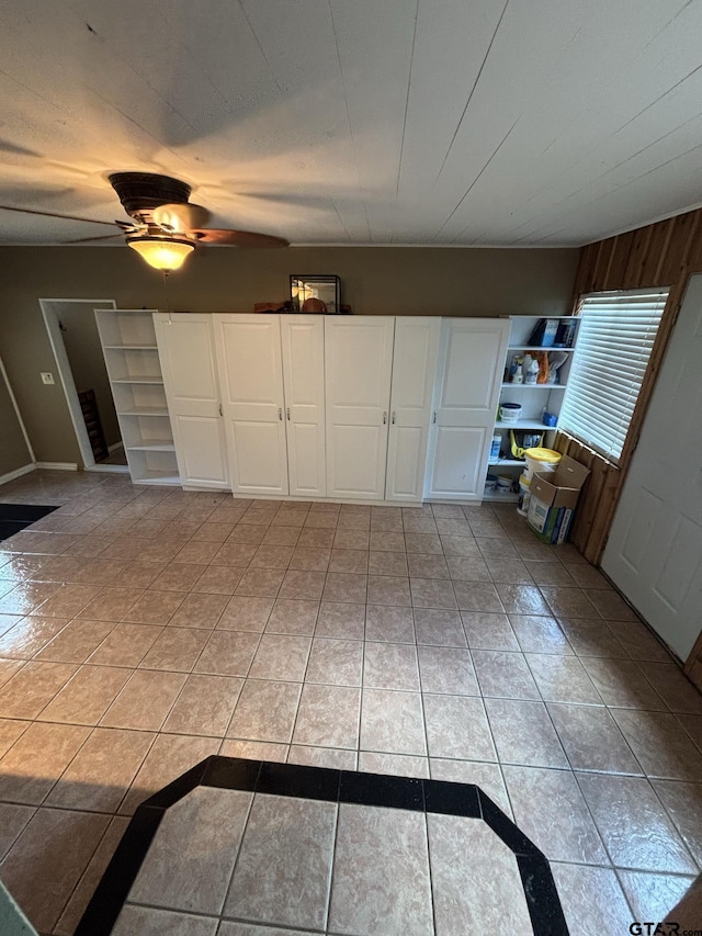 606 Glazner St, Hawkins, TX 75765 - interior space featuring ceiling fan and wood walls