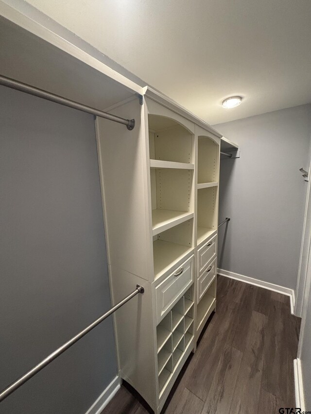 606 Glazner St, Hawkins, TX 75765 - walk in closet featuring dark wood finished floors