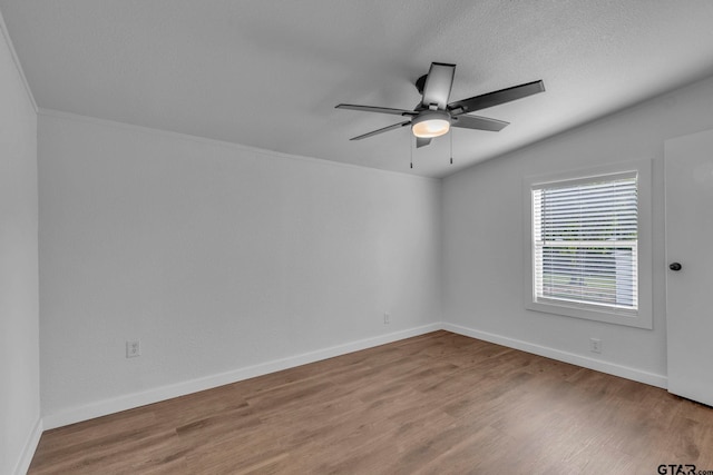 441 N Hill, Tyler, TX 75706 - unfurnished room featuring a ceiling fan, wood finished floors, and crown molding