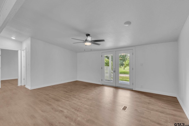 441 N Hill, Tyler, TX 75706 - spare room with a ceiling fan and light wood-style flooring