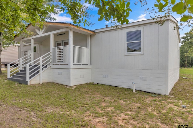 441 N Hill, Tyler, TX 75706 - back of property featuring a lawn and covered porch
