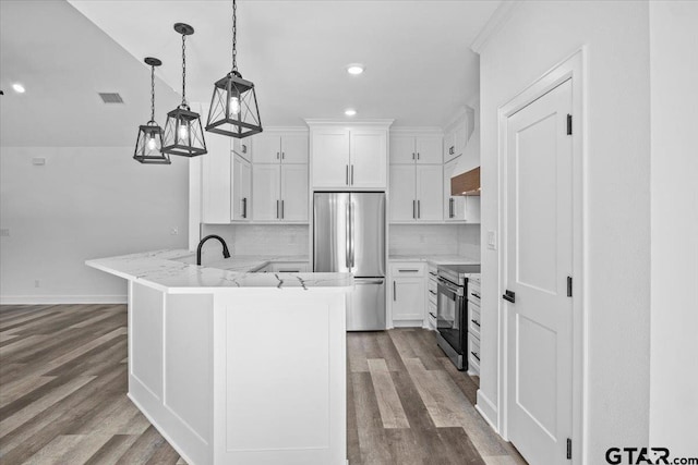 kitchen with white cabinetry, hanging light fixtures, stainless steel appliances, light stone counters, and decorative backsplash