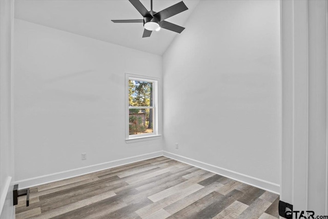 unfurnished room featuring light hardwood / wood-style floors, ceiling fan, and lofted ceiling