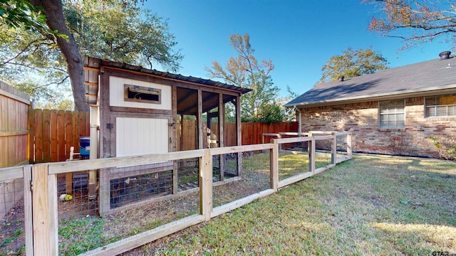 view of yard with an outdoor structure