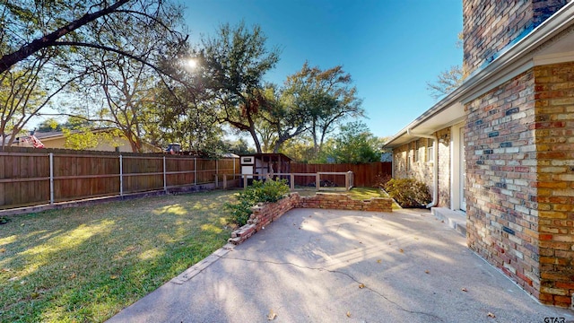 exterior space with a patio area and a shed