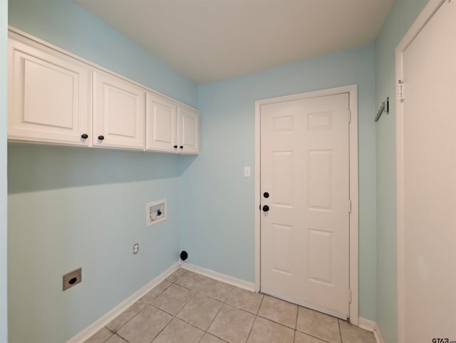 laundry area with washer hookup, electric dryer hookup, cabinets, and light tile patterned floors