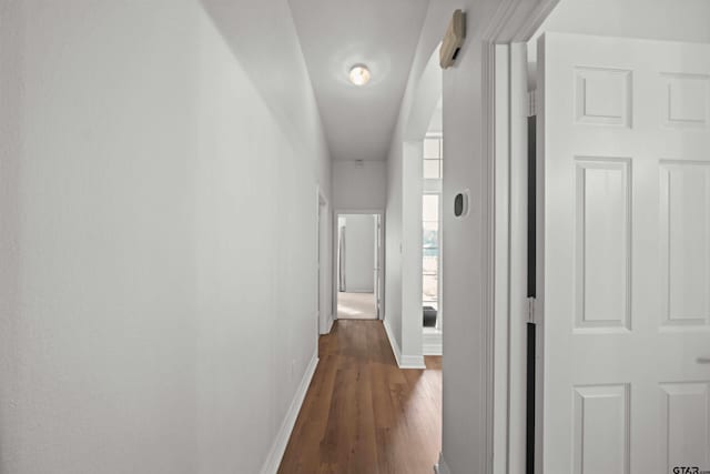 hallway featuring dark hardwood / wood-style floors