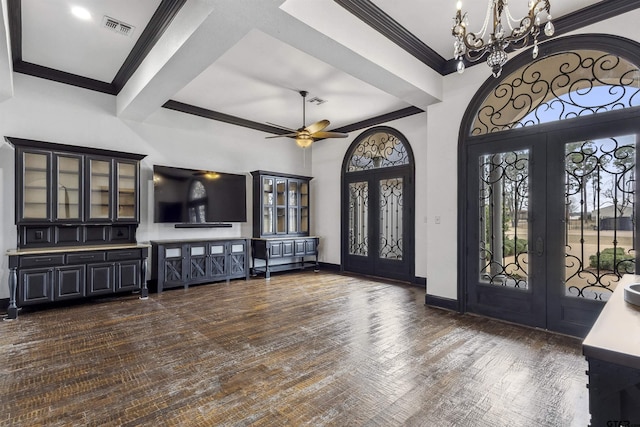 foyer featuring french doors, ornamental molding, dark hardwood / wood-style floors, beam ceiling, and ceiling fan with notable chandelier