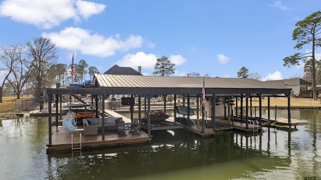 dock area with a water view